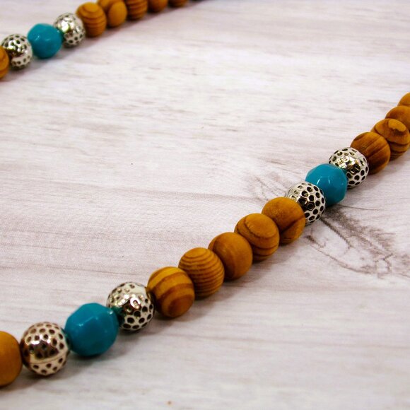 Wood bead necklace created with turquoise color beads and textured silver beads. - Picture 2 of 11